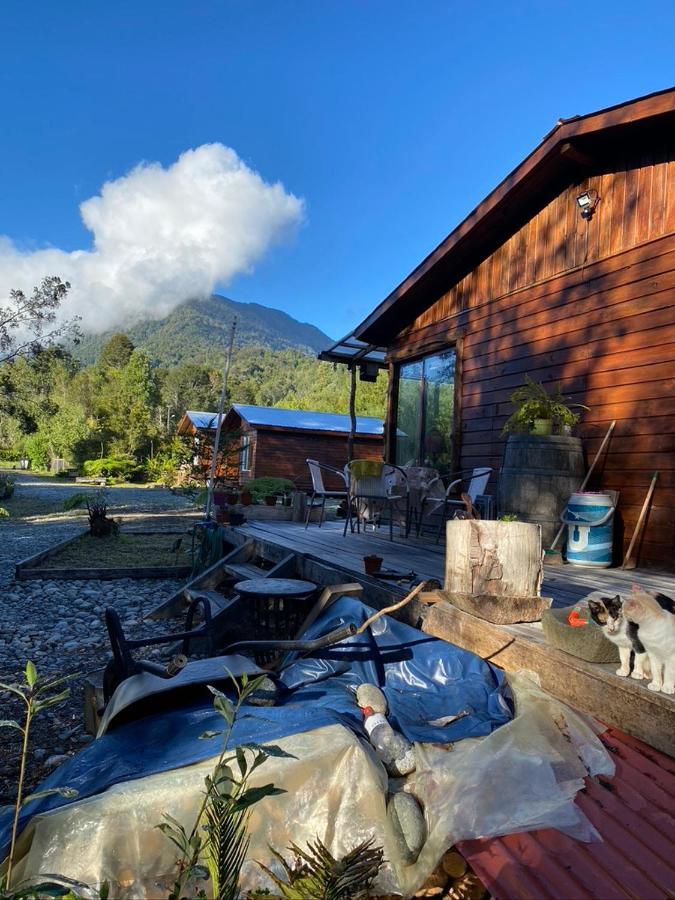 Cabanas & Tinajas Entre Volcanes Hornopiren Exterior foto