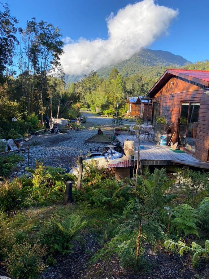 Cabanas & Tinajas Entre Volcanes Hornopiren Exterior foto
